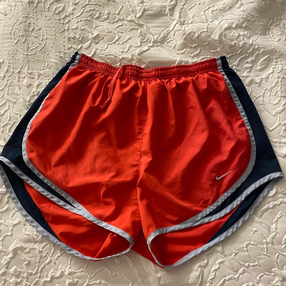 Coral Nike shorts